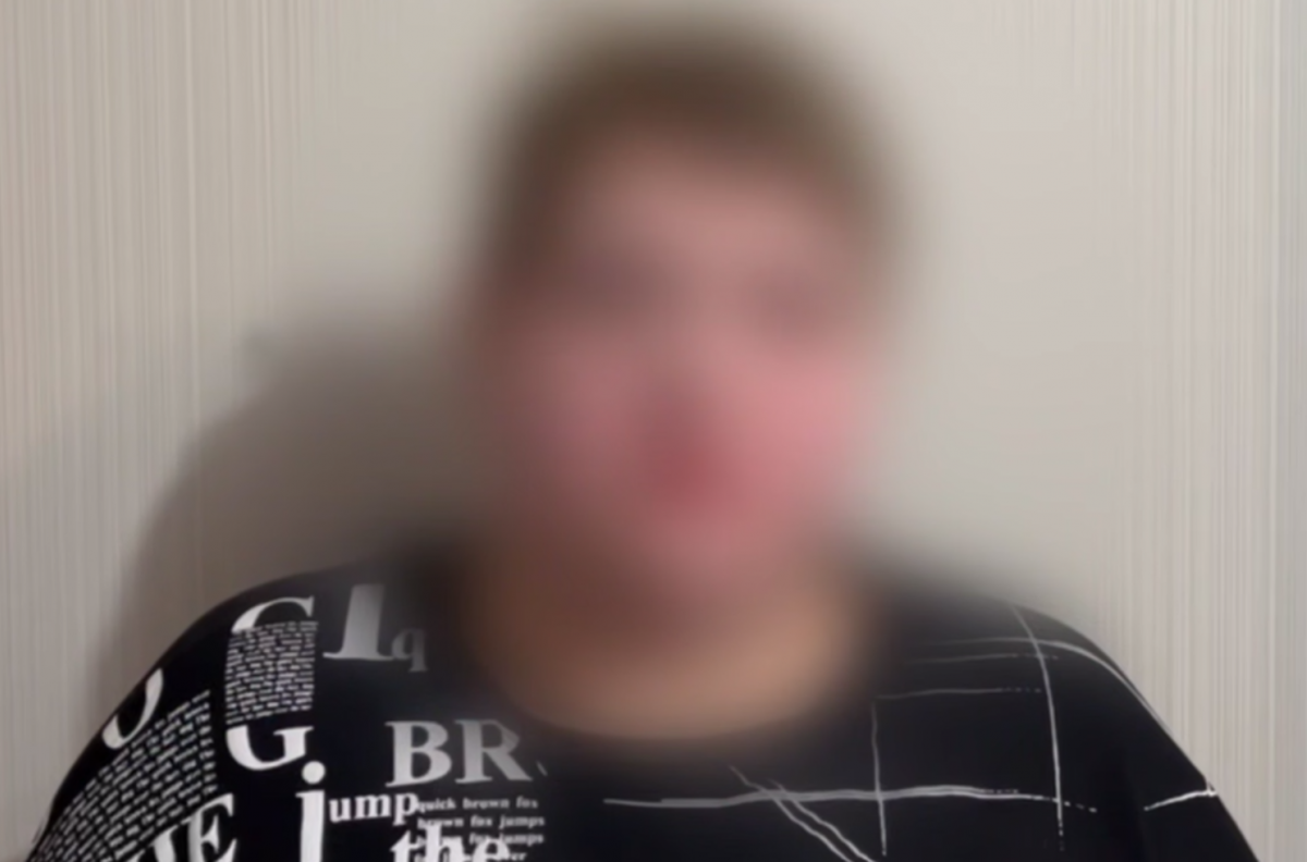 Задержанная оккупантами жительница Мариуполя. Фото: кадр из видео